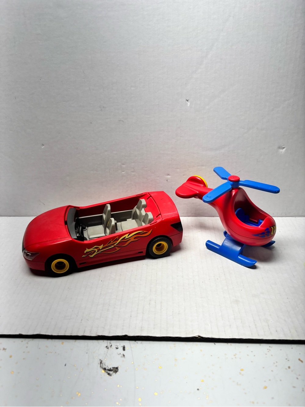 GEOBRA PLAYMOBIL 2007 -
4321 RED RACECAR & Playmobil Red Blue
Helicopter